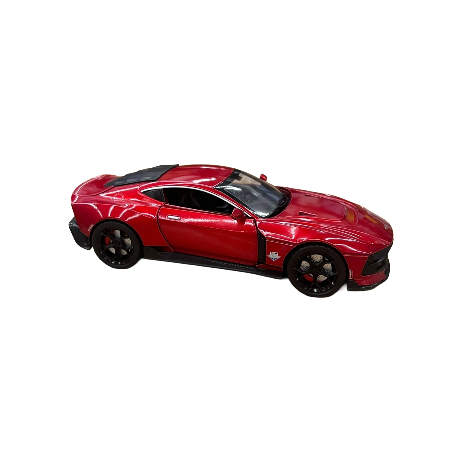Makinë metalike Aston Martin për fëmijë në shkallë 1:22, me dizajn sportiv, mekanizëm pull-back, drita, tinguj, dyer që hapen dhe funksion spray