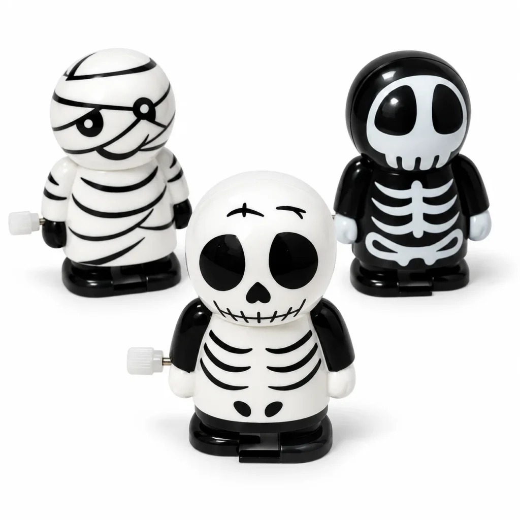 Lodër Halloween me çelës mekanik në 3 variante të ndryshme, mumie dhe skelete që ecin, prej materiali plastik.